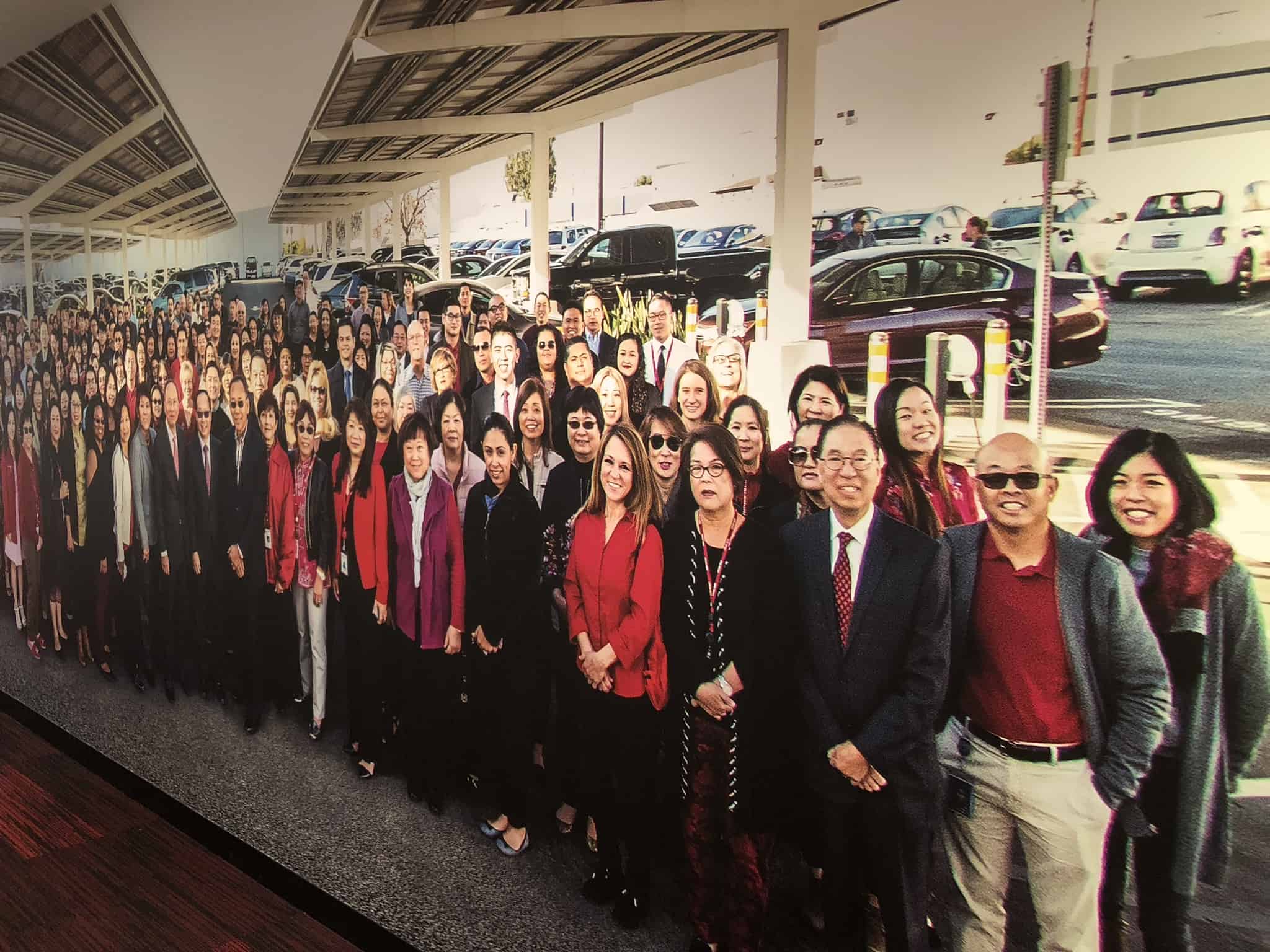 a group of people standing next to each other.