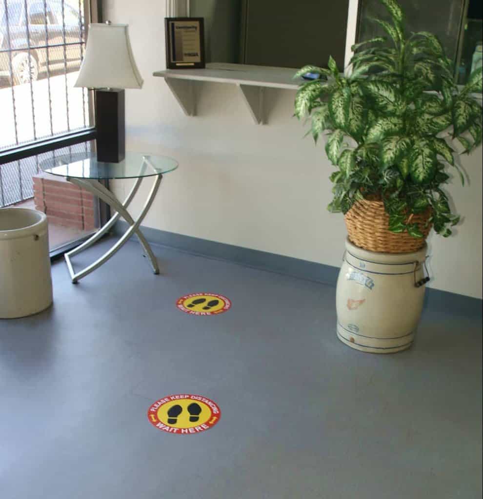 Social Distancing floor stickers at an office