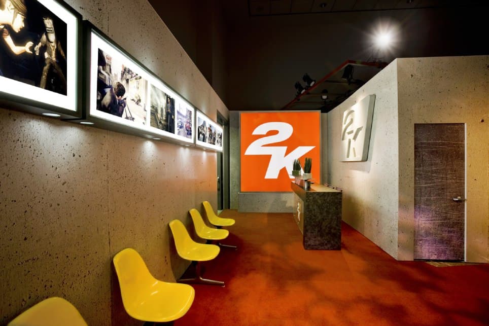 E3 K2 6 (1) a number of yellow chairs in a room.
