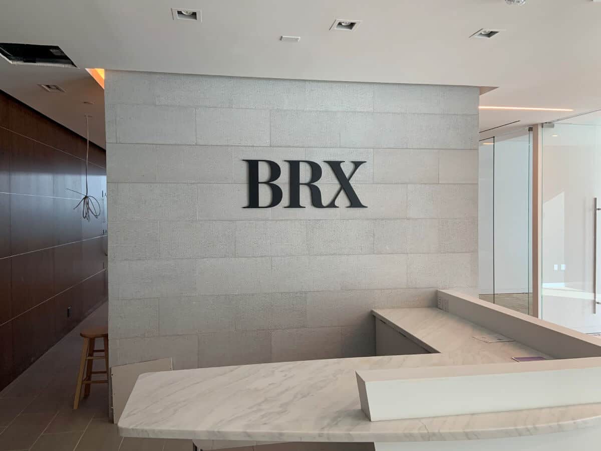 the brx logo is on the wall of the lobby.