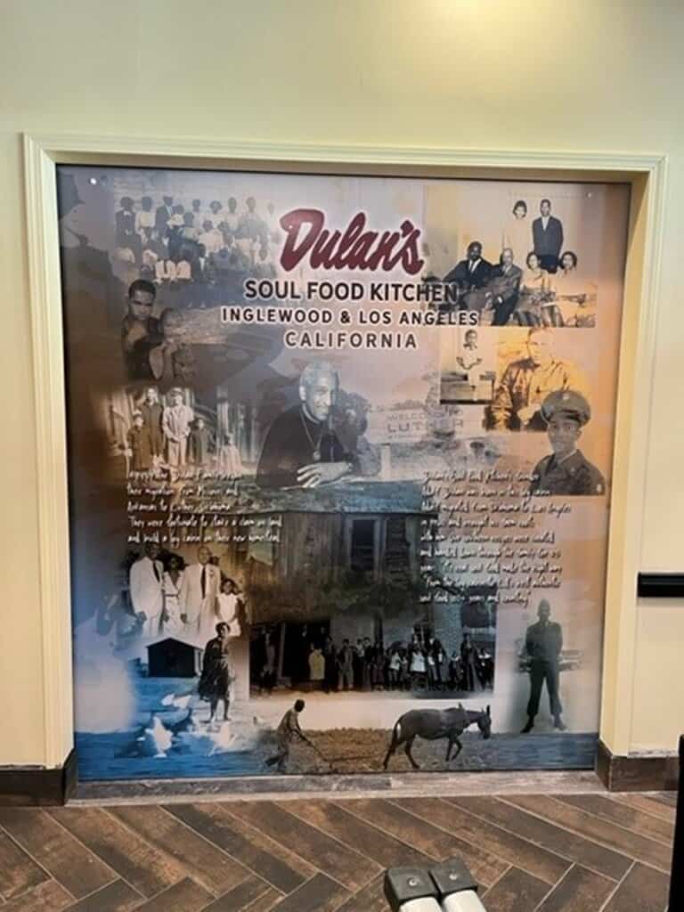 a business mural in restaurant Dulans in California featuring the story of the business along the time a business mural in restaurant Dulans in California featuring the story of the business along the time