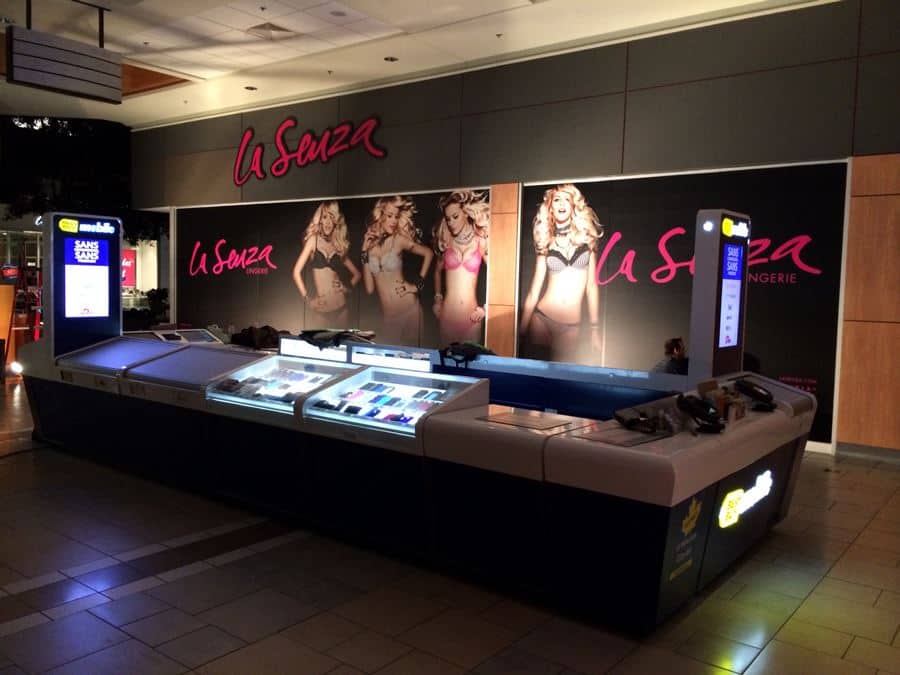 Fairview Pointe _ Window Graphics (1) a display of lingerie products in a mall.