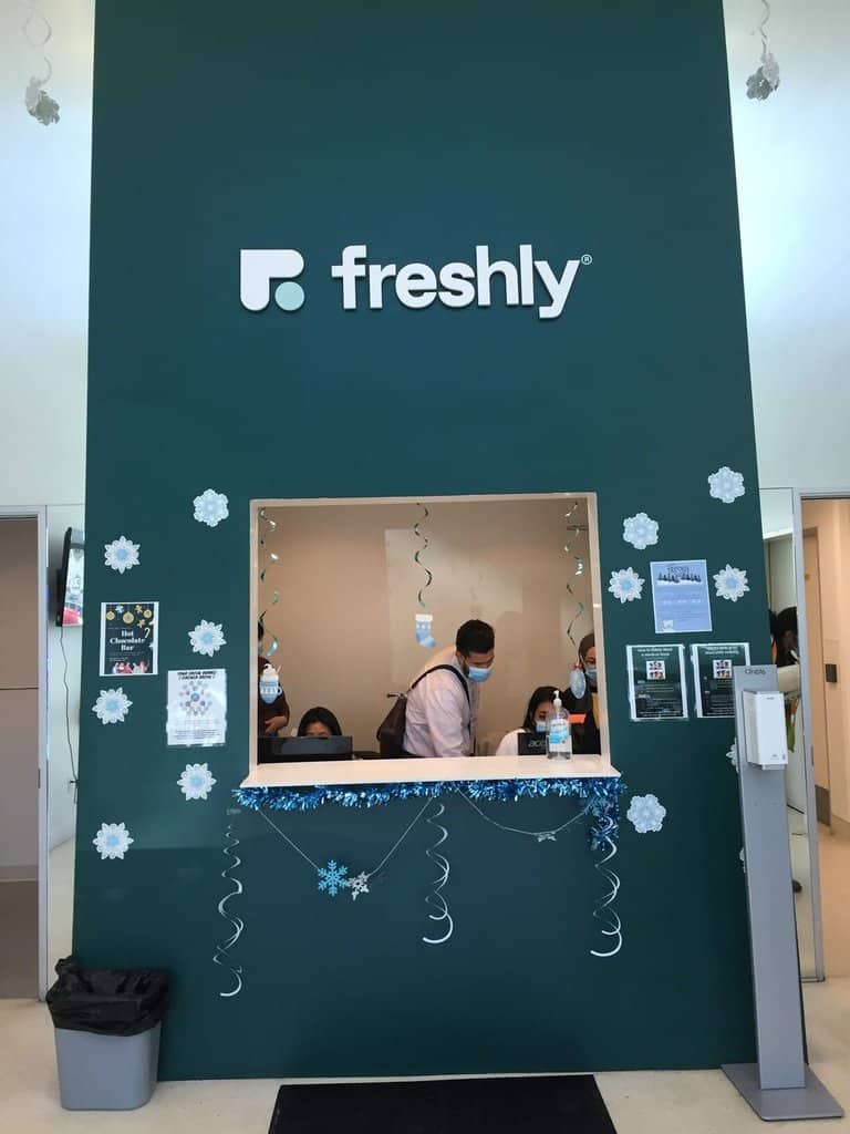 IMG_0571 a store front with a sign that says freshly.