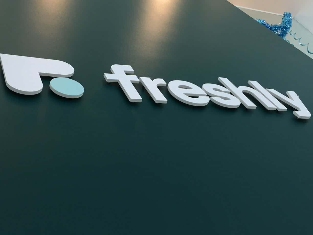 IMG_0573 a sign that says freshly on a wall.
