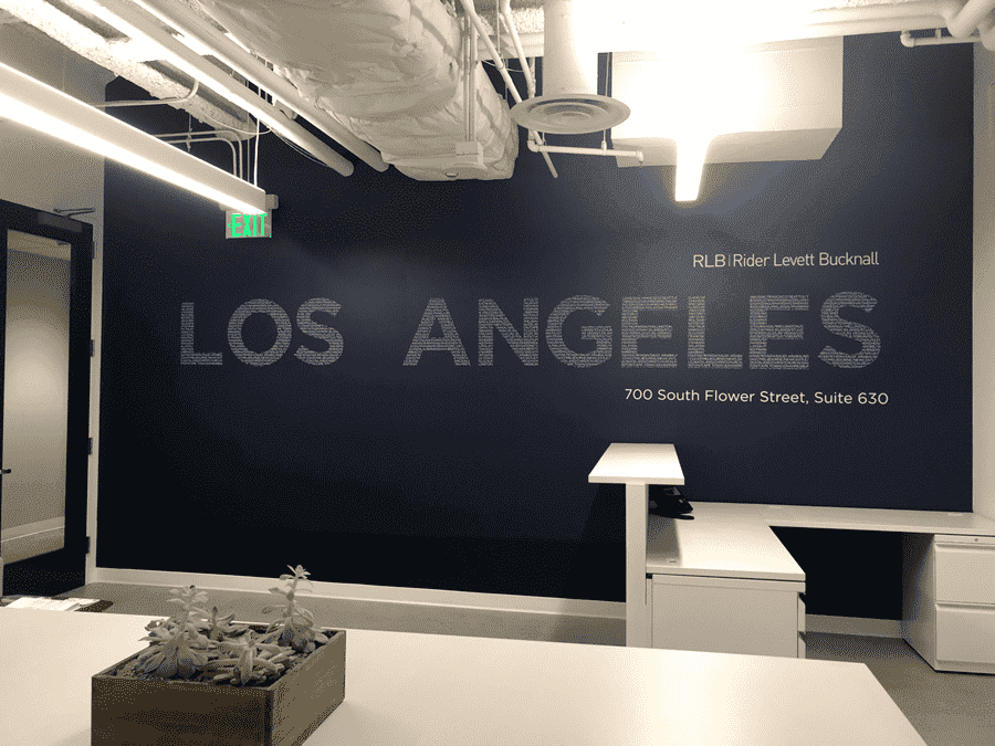 Main Wall a black and white photo of a los angeles office.