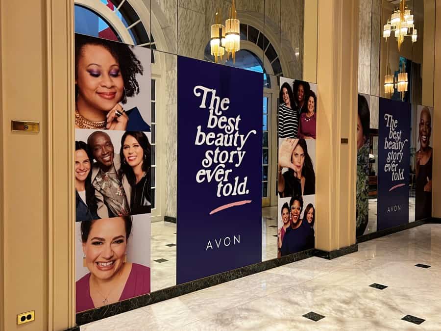 a hallway with a bunch of signs on the wall.