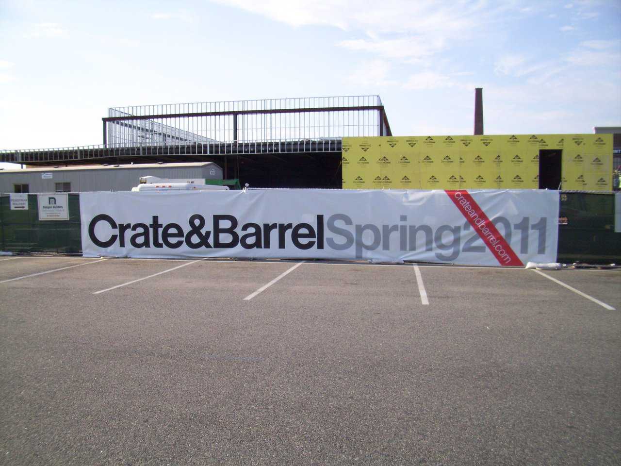 Construction banner for Crate and Barrel - a white construction banner with black and gray text that reads Crate & Barrel Spring 2011