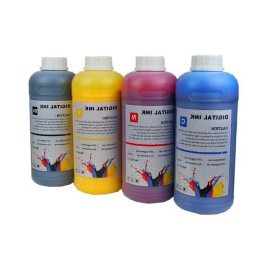 a group of three different colored ink bottles.