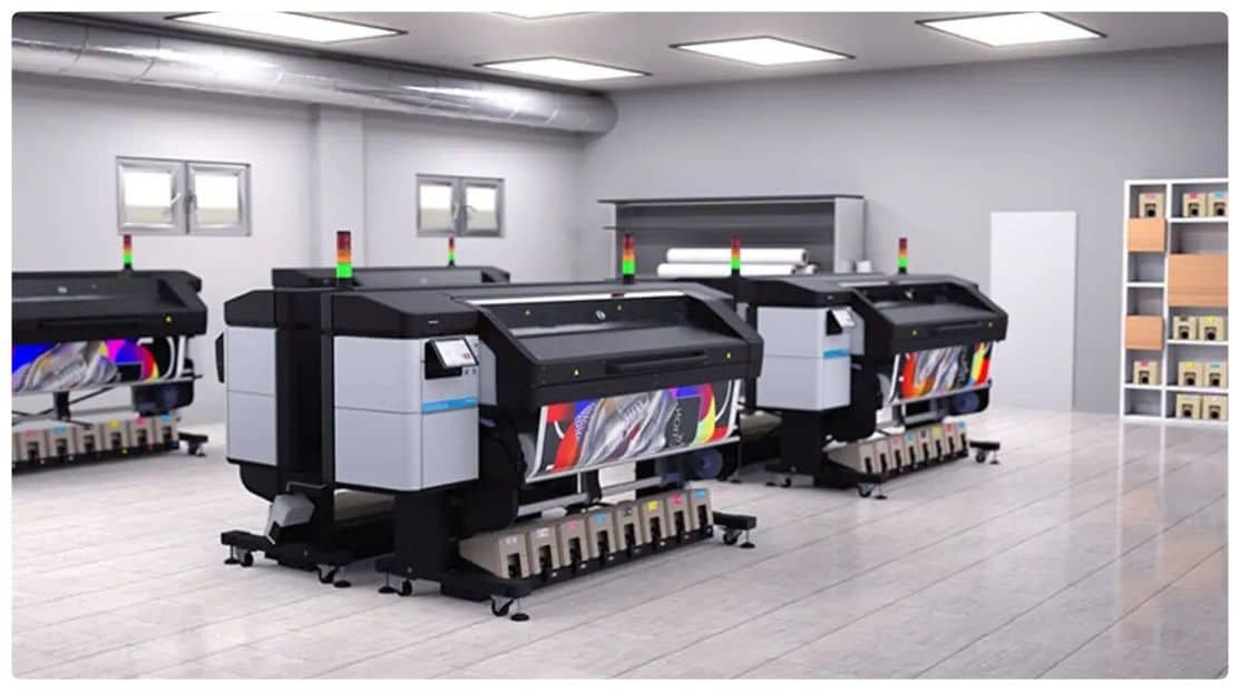 a row of printers in a large room.